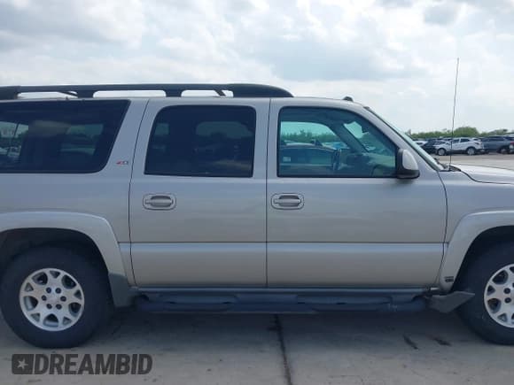 ✅ 2005 Chevrolet Suburban LS • VIN: 3GNEC16Z65G212582 • Лот: 42409878. Опубликован ранее на IAAI с пробегом 141 303 миль. Бесплатный доступ к архиву аукционных продаж из США и подробный отчёт об истории автомобиля на DreamBid. Изображение 13.