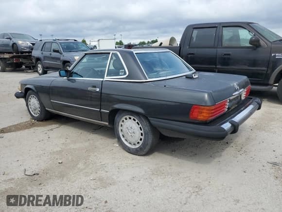 ✅ 1987 Mercedes-Benz 560 SL • VIN: WDBBA48D0HA074043 • Lot: 65358535. Listed on Copart with 123,596 mi. Free auction sales archive from the USA and detailed vehicle history report at DreamBid. Image 2.