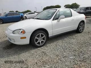 ✅ 1997 Honda del Sol Si • VIN: JHMEH6162VS006574 • Lot: 64474595. Listed on Copart with 140,800 mi. Free auction sales archive from the USA and detailed vehicle history report at DreamBid. Image 1.