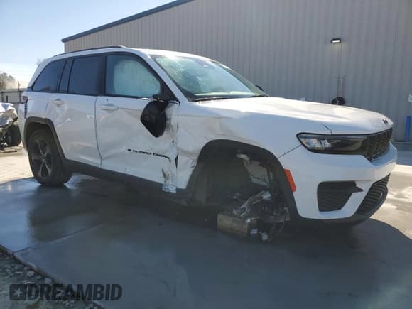 ✅ 2023 Jeep Grand Cherokee Altitude • VIN: 1C4RJGAG3PC571130 • Lot: 49879155. Listed on Copart with 24,563 mi. Free auction sales archive from the USA and detailed vehicle history report at DreamBid. Image 4.