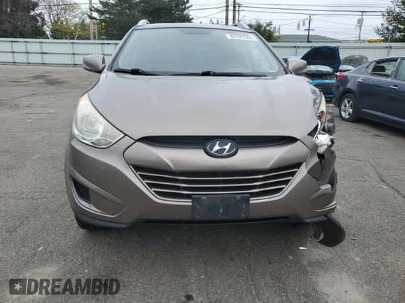 ✅ 2011 Hyundai Tucson GLS • VIN: KM8JU3AC7BU171936 • Лот: 82522355. Опубликован ранее на Copart с пробегом 327 309 миль. Бесплатный доступ к архиву аукционных продаж из США и подробный отчёт об истории автомобиля на DreamBid. Изображение 5.