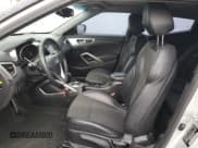 ✅ 2013 Hyundai Veloster w/Gray Int • VIN: KMHTC6AD2DU093056 • Lot: 81179253. Listed on Copart with 144,405 mi. Free auction sales archive from the USA and detailed vehicle history report at DreamBid. Image 7.