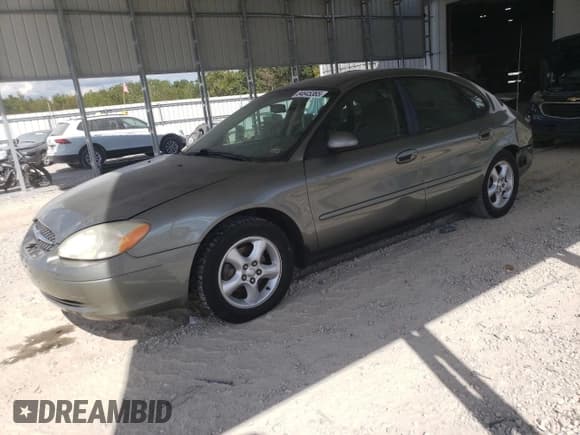 ✅ 2001 Ford Taurus SES • VIN: 1FAFP55U71G173379 • Лот: 84645365. Опубликован ранее на Copart с пробегом 145 452 миль. Бесплатный доступ к архиву аукционных продаж из США и подробный отчёт об истории автомобиля на DreamBid. Изображение 1.