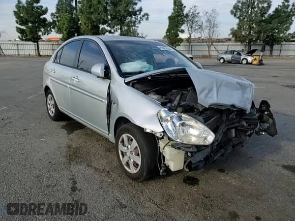 2008 Hyundai Accent GLS z VIN KMHCN46C98U234256, wystawiony jako Copart lot #83089384 z przebiegiem 153 802 mil mil oraz Szkoda całkowita • Salvage title. Historia ofert i sprzedaży dostępna na DreamBid. Obrazek 11.