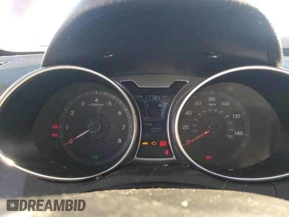 2012 Hyundai Veloster w/Red Int z VIN KMHTC6AD9CU084434, wystawiony jako Copart lot #83387244 z przebiegiem 177 841 mil mil oraz Czysty tytuł • Clean title. Historia ofert i sprzedaży dostępna na DreamBid. Obrazek 9.