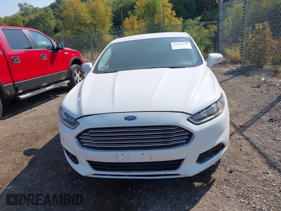 ✅ 2016 Ford Fusion SE Hybrid • VIN: 3FA6P0LU8GR404264 • Lot: 43201129. Listed on IAAI with 231,940 mi. Free auction sales archive from the USA and detailed vehicle history report at DreamBid. Image 12.