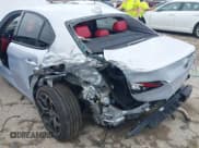 ✅ 2021 Alfa Romeo Giulia • VIN: ZARFAMAN6M7645490 • Lot: 42165037. Listed on IAAI with 57,701 mi. Free auction sales archive from the USA and detailed vehicle history report at DreamBid. Image 6.