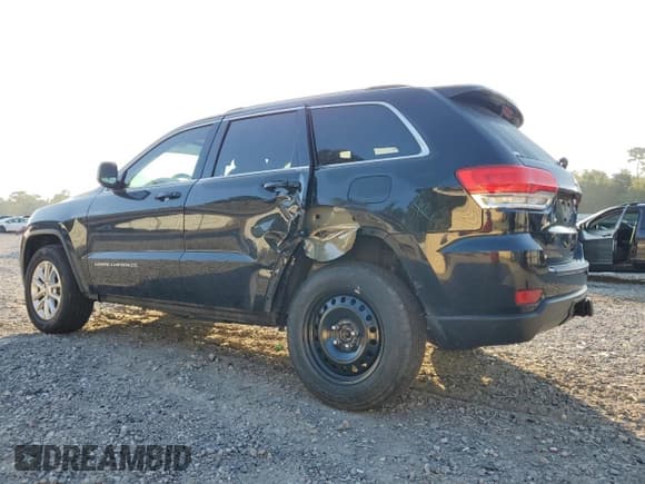 ✅ 2015 Jeep Grand Cherokee Laredo • VIN: 1C4RJEAG2FC707086 • Lot: 84167785. Listed on Copart with 100,035 mi. Free auction sales archive from the USA and detailed vehicle history report at DreamBid. Image 2.