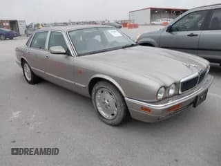 ✅ 1997 Jaguar XJ • VIN: SAJHX1248VC809080 • Lot: 43910099. Listed on IAAI with 87,580 mi. Free auction sales archive from the USA and detailed vehicle history report at DreamBid. Image 1.