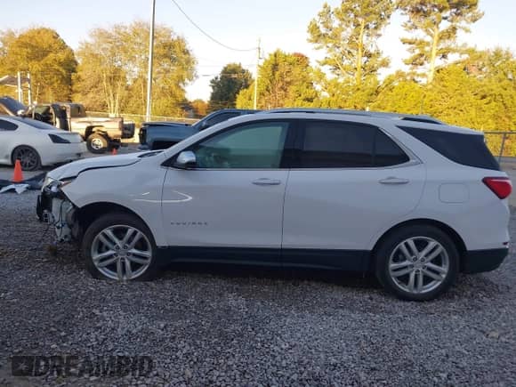 2020 Chevrolet Equinox Premier with VIN 3GNAXPEX7LS719569, listed as a IAAI auction lot 43479451 with 36,680 mi miles and . Bid and sale history available at DreamBid. Image 14.