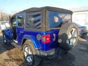 ✅ 2018 Jeep Wrangler Unlimited Sahara • VIN: 1C4HJXEG5JW256700 • Lot: 43705906. Listed on IAAI with 127,599 mi. Free auction sales archive from the USA and detailed vehicle history report at DreamBid. Image 3.