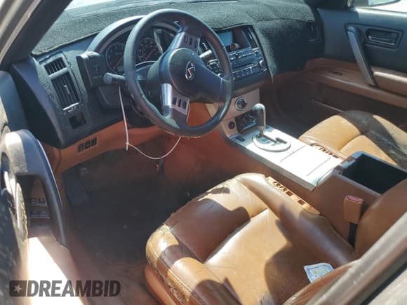 ✅ 2004 Infiniti FX • VIN: JNRAS08W44X211657 • Лот: 68697285. Опубликован ранее на Copart с пробегом Не указан. Бесплатный доступ к архиву аукционных продаж из США и подробный отчёт об истории автомобиля на DreamBid. Изображение 8.