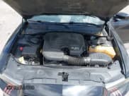 ✅ 2013 Dodge Charger SXT Plus • VIN: 2C3CDXJG1DH584579 • Lot: 42128401. Listed on IAAI with 100,388 mi. Free auction sales archive from the USA and detailed vehicle history report at DreamBid. Image 10.