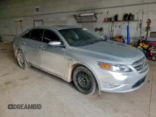 ✅ 2011 Ford Taurus SHO • VIN: 1FAHP2KT0BG118096 • Lot: 93745365. Listed on Copart with 147,532 mi. Free auction sales archive from the USA and detailed vehicle history report at DreamBid. Image 4.