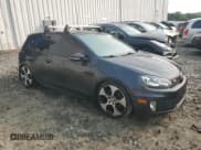 ✅ 2012 Volkswagen Golf GTI w/Conv & Sunroof • VIN: WVWEV7AJ7CW009478 • Lot: 58974025. Listed on Copart with 124,472 mi. Free auction sales archive from the USA and detailed vehicle history report at DreamBid. Image 4.