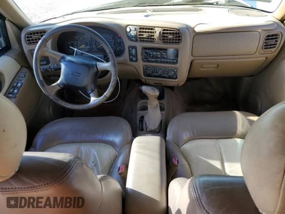 2000 Chevrolet Blazer LT with VIN 1GNDT13WXY2236550, listed as a Copart auction lot 77170574 with 221,994 mi miles and Salvage title. Bid and sale history available at DreamBid. Image 8.