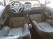 ✅ 2009 Honda Fit Sport • VIN: JHMGE87489S058493 • Лот: 87119375. Опубликован ранее на Copart с пробегом 174 803 миль. Бесплатный доступ к архиву аукционных продаж из США и подробный отчёт об истории автомобиля на DreamBid. Изображение 8.