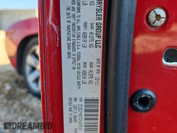 ✅ 2012 Dodge Challenger SXT • VIN: 2C3CDYAG7CH167519 • Lot: 84876065. Listed on Copart with 191,271 mi. Free auction sales archive from the USA and detailed vehicle history report at DreamBid. Image 13.