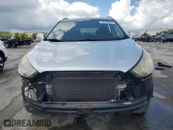 2013 Hyundai Tucson GLS z VIN KM8JU3AC4DU574811, wystawiony jako Copart lot #69299034 z przebiegiem 149 591 mil mil oraz Szkoda całkowita • Salvage title. Historia ofert i sprzedaży dostępna na DreamBid. Obrazek 5.