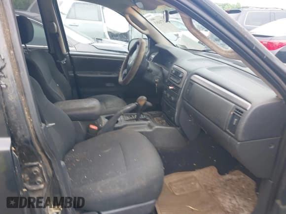✅ 2004 Jeep Grand Cherokee Laredo • VIN: 1J4GW48S54C185574 • Lot: 42371493. Listed on IAAI with 227,697 mi. Free auction sales archive from the USA and detailed vehicle history report at DreamBid. Image 5.