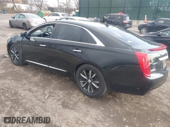 ✅ 2013 Cadillac XTS Livery • VIN: 2G61W5S30D9205565 • Lot: 43680796. Listed on IAAI with 263,933 mi. Free auction sales archive from the USA and detailed vehicle history report at DreamBid. Image 3.
