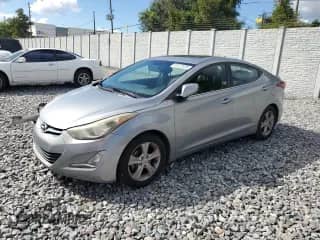 2016 Hyundai Elantra Value Edition with VIN KMHDH4AE4GU545063, listed as a Copart auction lot 87427525 with 111,769 mi miles and Salvage title. Bid and sale history available at DreamBid. Image 1.