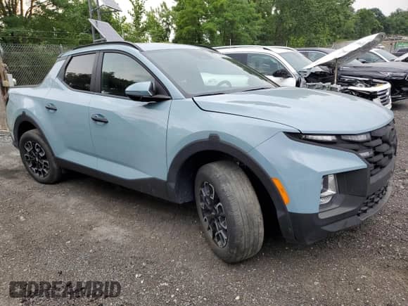 2022 Hyundai Santa Cruz SEL с VIN 5NTJCDAEXNH025366, выставлен на аукционе Copart как лот 64445254 с пробегом 38 771 миль миль и На запчасти • Non repairable. История ставок и продаж доступна на DreamBid. Изображение 4.