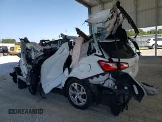 ✅ 2020 Chevrolet Equinox Premier • VIN: 3GNAXNEVXLS673318 • Лот: 66230105. Опубликован ранее на Copart с пробегом Не указан. Бесплатный доступ к архиву аукционных продаж из США и подробный отчёт об истории автомобиля на DreamBid. Изображение 2.