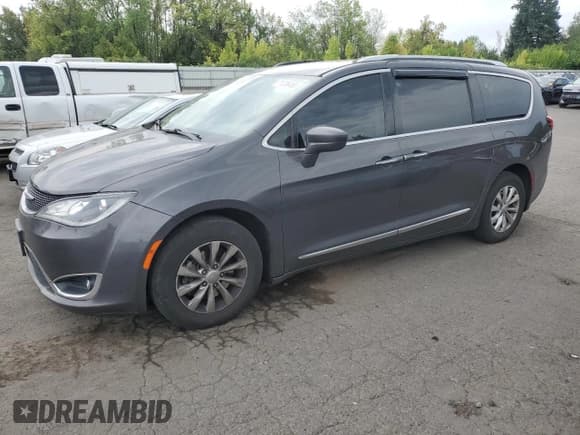 ✅ 2018 Chrysler Pacifica Touring L • VIN: 2C4RC1BG9JR124516 • Лот: 71738455. Опубликован ранее на Copart с пробегом 168 762 миль. Бесплатный доступ к архиву аукционных продаж из США и подробный отчёт об истории автомобиля на DreamBid. Изображение 1.