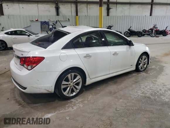 ✅ 2014 Chevrolet Cruze LTZ • VIN: 1G1PG5SB5E7203818 • Lot: 83825085. Listed on Copart with 94,394 mi. Free auction sales archive from the USA and detailed vehicle history report at DreamBid. Image 3.
