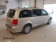 ✅ 2014 Dodge Grand Caravan SXT • VIN: 2C4RDGCG2ER105598 • Lot: 42648383. Listed on IAAI with 103,238 mi. Free auction sales archive from the USA and detailed vehicle history report at DreamBid. Image 4.
