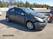 ✅ 2013 Kia Rio SX • VIN: KNADN5A34D6129822 • Lot: 80311235. Listed on Copart with 97,909 mi. Free auction sales archive from the USA and detailed vehicle history report at DreamBid. Image 4.