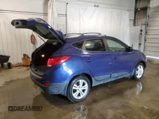 2012 Hyundai Tucson GLS z VIN KM8JU3AC4CU522240, wystawiony jako Copart lot #62401824 z przebiegiem 48 260 mil mil oraz Szkoda całkowita • Salvage title. Historia ofert i sprzedaży dostępna na DreamBid. Obrazek 3.