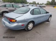 ✅ 1997 Ford Taurus G • VIN: 1FALP51U0VA295342 • Lot: 43075706. Wystawiony na IAAI z przebiegiem 135 748 mil. Bezpłatny archiwum sprzedaży aukcyjnych z USA i szczegółowy raport historii pojazdu na DreamBid. Zdjęcie 4.
