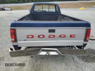 1991 Dodge Dakota S z VIN 1B7FL26Y5MS364290, wystawiony jako Copart lot #56398945 z przebiegiem 98 390 mil mil oraz Szkoda całkowita • Salvage title. Historia ofert i sprzedaży dostępna na DreamBid. Obrazek 6.