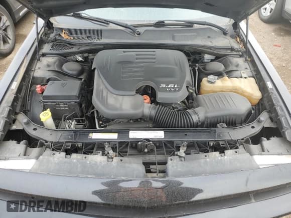 ✅ 2012 Dodge Challenger SXT • VIN: 2C3CDYAG5CH206804 • Lot: 83079794. Wystawiony na Copart z przebiegiem 146 989 mil. Bezpłatny archiwum sprzedaży aukcyjnych z USA i szczegółowy raport historii pojazdu na DreamBid. Zdjęcie 11.