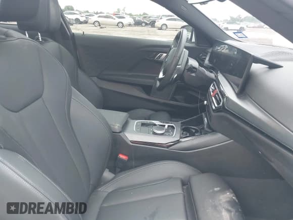 ✅ 2023 BMW 2 Series 230i • VIN: 3MW23CM02P8D39187 • Lot: 42207930. Listed on IAAI with 23,310 mi. Free auction sales archive from the USA and detailed vehicle history report at DreamBid. Image 5.