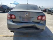 ✅ 2009 Volkswagen Jetta S • VIN: 3VWJZ71K39M128033 • Lot: 61787605. Wystawiony na Copart z przebiegiem 180 000 mil. Bezpłatny archiwum sprzedaży aukcyjnych z USA i szczegółowy raport historii pojazdu na DreamBid. Zdjęcie 6.