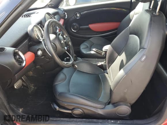 ✅ 2012 MINI Coupe S • VIN: WMWSX3C59CT465745 • Lot: 61914575. Listed on Copart with Not provided. Free auction sales archive from the USA and detailed vehicle history report at DreamBid. Image 7.