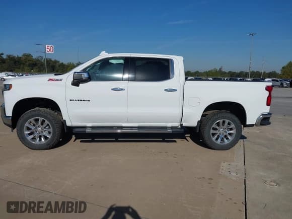 ✅ 2021 Chevrolet Silverado 1500 LTZ • VIN: 3GCUYGEDXMG138113 • Lot: 43593850. Listed on IAAI with 122,465 mi. Free auction sales archive from the USA and detailed vehicle history report at DreamBid. Image 14.