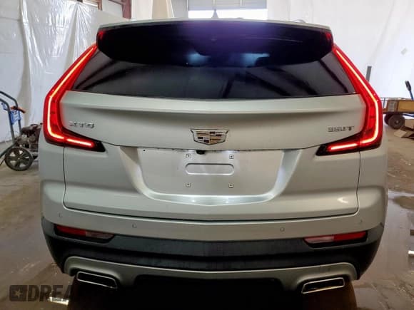 ✅ 2022 Cadillac XT4 FWD Premium Luxury • VIN: 1GYFZCR47NF100232 • Lot: 54520405. Listed on Copart with 68,819 mi. Free auction sales archive from the USA and detailed vehicle history report at DreamBid. Image 6.