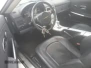 ✅ 2005 Chrysler Crossfire Limited • VIN: 1C3AN65L75X056564 • Lot: 76039594. Listed on Copart with 68,256 mi. Free auction sales archive from the USA and detailed vehicle history report at DreamBid. Image 8.