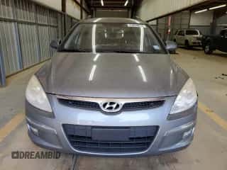 2010 Hyundai Elantra SE z VIN KMHDC8AE7AU060896, wystawiony jako Copart lot #71583564 z przebiegiem 123 991 mil mil oraz Szkoda całkowita • Salvage title. Historia ofert i sprzedaży dostępna na DreamBid. Obrazek 5.