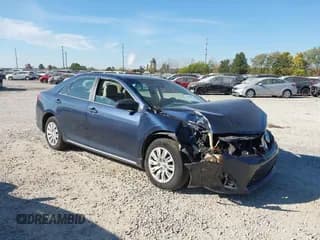 ✅ 2014 Toyota Camry SE • VIN: 4T1BF1FK5EU855424 • Lot: 43555987. Listed on IAAI with 287,159 mi. Free auction sales archive from the USA and detailed vehicle history report at DreamBid. Image 1.