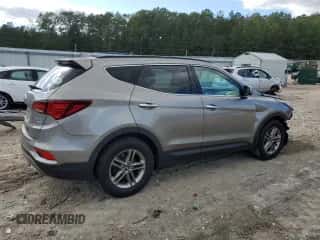 2017 Hyundai Santa Fe 2.4L z VIN 5XYZUDLBXHG430088, wystawiony jako Copart lot #84552795 z przebiegiem 132 399 mil mil oraz Czysty tytuł • Clean title. Historia ofert i sprzedaży dostępna na DreamBid. Obrazek 3.