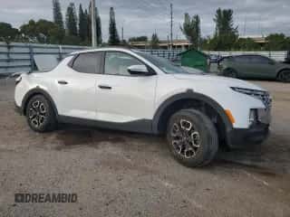2022 Hyundai Santa Cruz SEL с VIN 5NTJC4AE3NH017822, выставлен на аукционе Copart как лот 81253684 с пробегом 25 955 миль миль и На запчасти • Non repairable. История ставок и продаж доступна на DreamBid. Изображение 4.