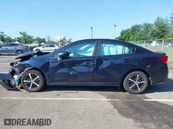 ✅ 2019 Subaru Impreza Premium • VIN: 4S3GKAC63K3601015 • Lot: 42534723. Listed on IAAI with 67,844 mi. Free auction sales archive from the USA and detailed vehicle history report at DreamBid. Image 14.
