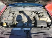 ✅ 2009 Dodge Challenger SE • VIN: 2B3LJ44V99H535569 • Lot: 86200304. Wystawiony na Copart z przebiegiem 233 716 mil. Bezpłatny archiwum sprzedaży aukcyjnych z USA i szczegółowy raport historii pojazdu na DreamBid. Zdjęcie 11.