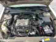 2001 Chevrolet Malibu with VIN 1G1ND52J71M683296, listed as a Copart auction lot 82619054 with 65,535 mi miles and Salvage title. Bid and sale history available at DreamBid. Image 13.