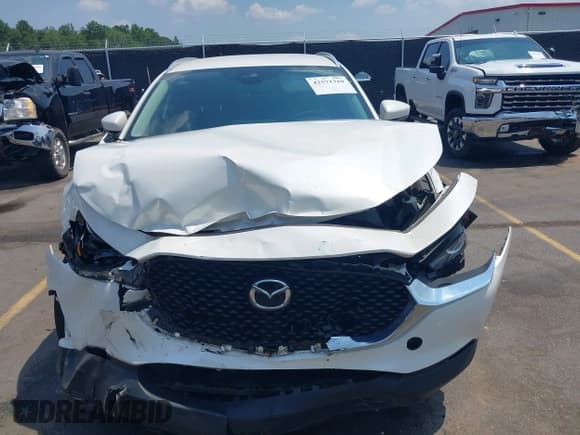 ✅ 2023 Mazda CX-30 S Select • VIN: 3MVDMBBM2PM520529 • Lot: 42571310. Listed on IAAI with 43,390 mi. Free auction sales archive from the USA and detailed vehicle history report at DreamBid. Image 12.